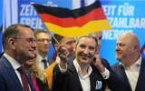 Leader of the far-right AfD Alice Weidel waves a German flag at the AfD party headquarters in Berlin on February 23, 2025, after the German national election. (Michael Probst/AP)
