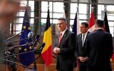 Foreign Minister Gideon Sa'ar, center, speaks with the media as he arrives for an EU-Israel meeting at the European Council building in Brussels, Belgium, February 24, 2025. (AP Photo/Virginia Mayo)