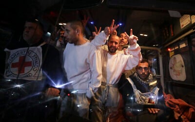 Illustrative: Freed Palestinian prisoners flash V-signs as they arrive in the Gaza Strip after being released from an Israeli prison following a ceasefire agreement between Hamas and Israel in Khan Younis, Gaza Strip on February 27, 2025. (AP Photo/Jehad Alshrafi) Illustrative: Freed Palestinian prisoners flash V-signs as they arrive in the Gaza Strip after being released from an Israeli prison following a ceasefire agreement between Hamas and Israel in Khan Younis, Gaza Strip on February 27, 2025. (AP Photo/Jehad Alshrafi)