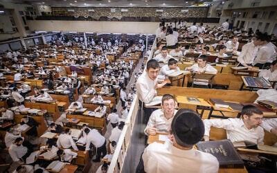 Ultra-Orthodox students study at the Ponevezh Yeshiva  in Bnei Brak, February 27, 2024. (Chaim Goldberg/Flash90)