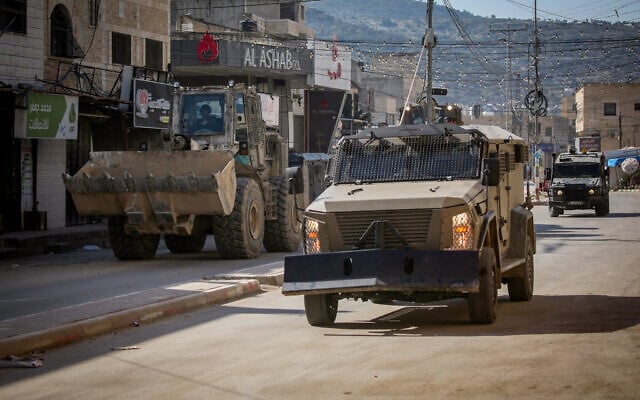 Israeli security forces seen during a military operation in the West Bank city of Qabatiya, January 10, 2025. (Nasser Ishtayeh/Flash90) Israeli security forces seen during a military operation in the West Bank city of Qabatiya, January 10, 2025. (Nasser Ishtayeh/Flash90)