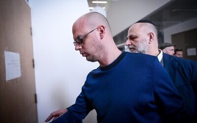 Eli Feldstein, a spokesman in the Prime Minister's Office accused of leaking stolen IDF intelligence classified documents, arrives for a court hearing at the District Court in Tel Aviv, January 14, 2025. (Avshalom Sassoni/Flash90)