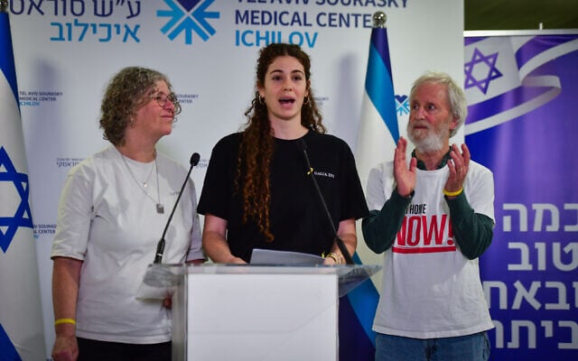 Family members of released Hamas hostage Keith Siegel -- (L-R) his wife, Aviva Siegel, who is also a former hostage; daughter Shir Siegel; and brother, Lee Siegel -- hold a press conference at the Tel Aviv Sourasky Medical Center - Ichilov, on February 3, 2025. (Avshalom Sassoni/Flash90)