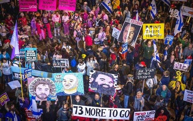 Demonstrators protest for the release of the hostages and against the government, outside the IDF's Kirya military headquarters in Tel Aviv, February 15, 2025. (Miriam Alster/Flash90)