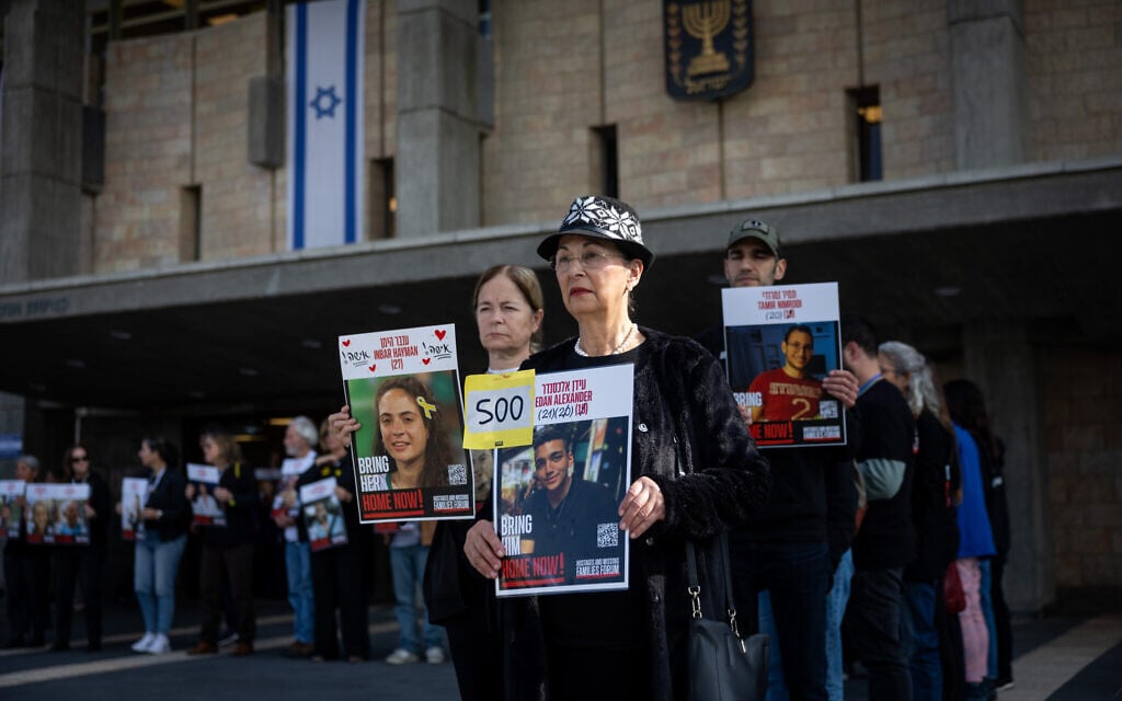 Activists including relatives of hostages held in the Gaza Strip rally for their return outside the Knesset in Jerusalem, marking 500 days since the start of the war between Israel and Hamas, February 17, 2025. (Yonatan Sindel/Flash90)