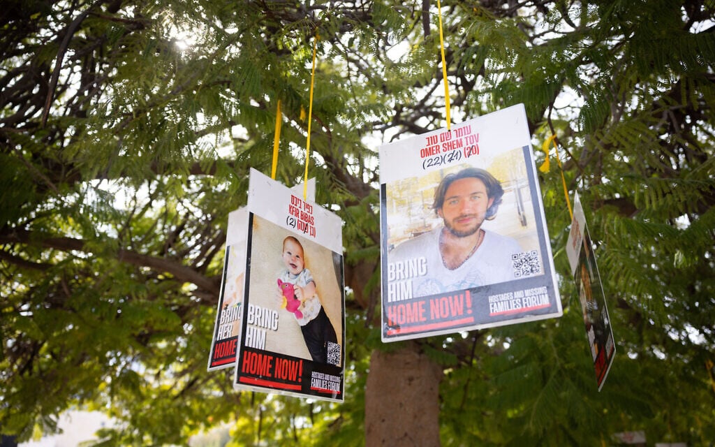 Signs at Hostage Square in Tel Aviv. February 19, 2025 (Miriam Alster/FLASH90)