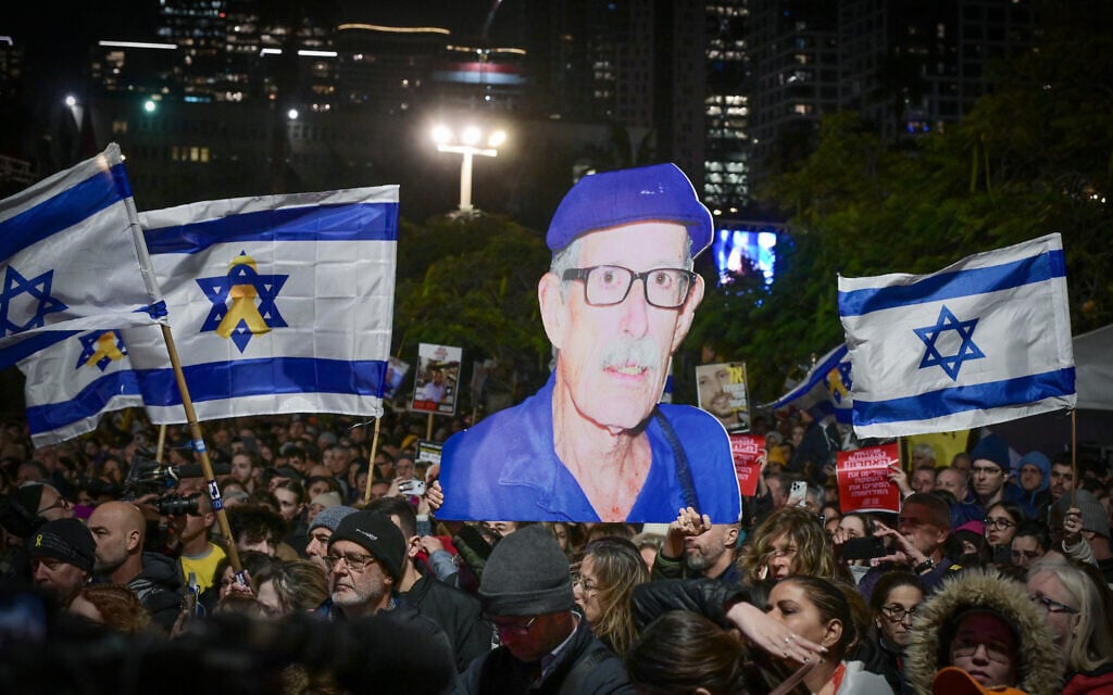 People gather at Hostages Square in Tel Aviv, on the day that Hamas released what it said were the remains of four slain hostages, including Oded Lifshitz, whose body has been positively identified; February 20, 2025. (Avshalom Sassoni/Flash90)