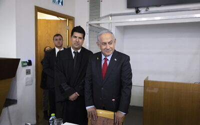 Prime Minister Benjamin Netanyahu arrives at Tel Aviv District Court to testify in his criminal trial, February 24, 2025. (Moti Milrod/POOL)