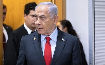 Prime Minister Benjamin Netanyahu arrives at the Tel Aviv District Court to testify in his corruption trial, February 24, 2025. (Moti Milrod/Pool)