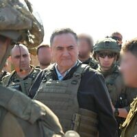 Defense Minister Israel Katz, center, visits an IDF position in southern Lebanon alongside senior IDF officials, February 2, 2025. (Ariel Hermoni/Defense Ministry)