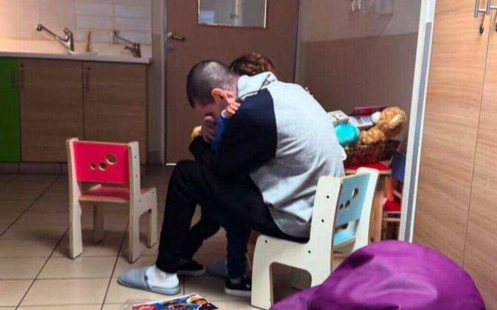 Released hostage Or Levy reunites with his three-year-old son Almog after 491 days in captivity in Gaza, at Sheba Medical Center near Tel Aviv, February 8, 2025. (Courtesy)