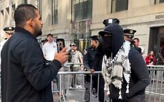 Abraham Hamra faces off with a pro-Palestinian protester in New York City. (Courtesy)