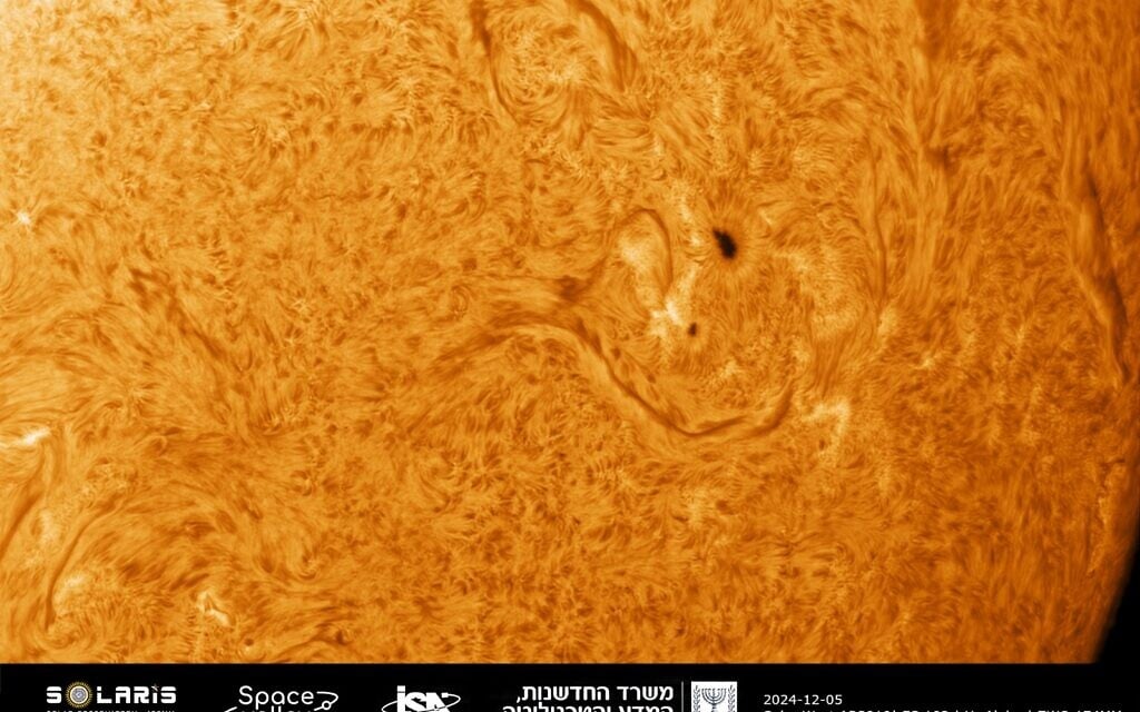 A photograph of the sun's chromosphere through a hydrogen filter showing solar activity, taken with a telescope at Solaris, Israel's first and only national solar observatory in Isfiya (Courtesy)