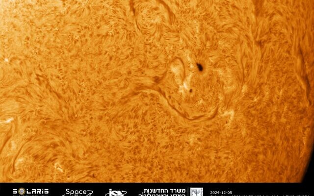A photograph of the sun's chromosphere through a hydrogen filter showing solar activity, taken with a telescope at Solaris, Israel's first and only national solar observatory in Isfiya (Courtesy)