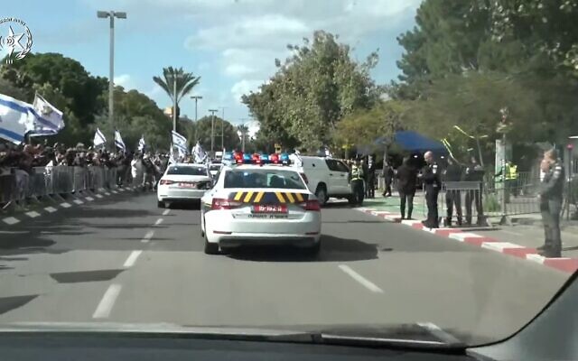A convoy of IDF vehicles, escorted by the Israel Police, carrying coffins apparently containing the bodies of four slain Israeli hostages, arrives at the Abu Kabir forensic institute in Tel Aviv, February 20, 2025. (Screenshot/Israel Police)