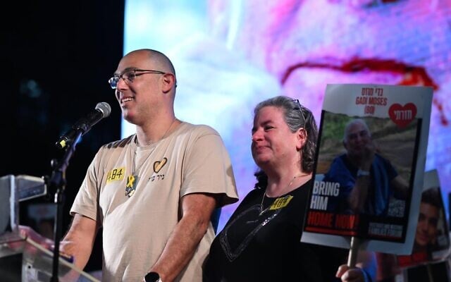 Yair Mozes, son of released hostage Gadi Mozes, speaking at Tel Aviv's Hostages Square on February 1, 2025 (Courtesy Alon Gilboa)