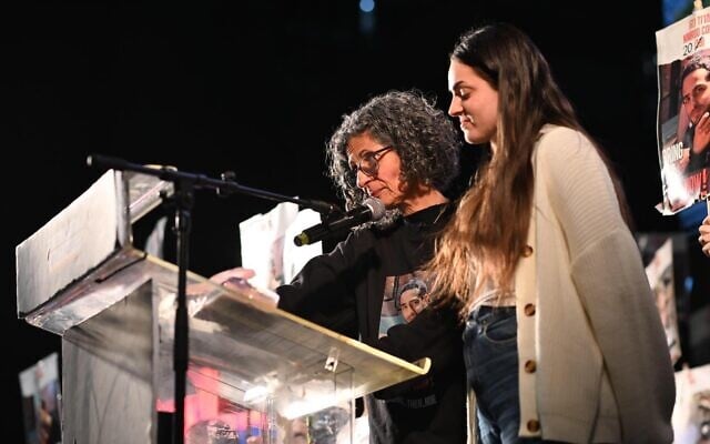 Vicky and Romi Cohen, mother and sister of hostage Nimrod Cohen, speaking at Hostages Square on February 1, 2025 (Courtesy Lior Rotstein)