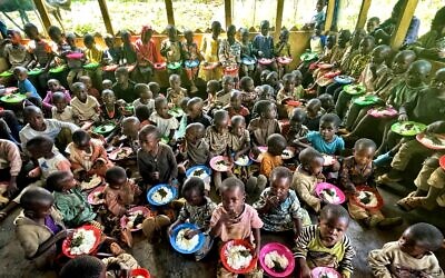 In this undated photo, malnourished children eat nutritious meals at the Africa 3030 compound in the eastern Democratic Republic of Congo. (Courtesy)