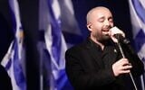 Singer Omer Adam performs at a memorial event in Hostages Square in Tel Aviv, February 20, 2025. (Alon Gilboa/Pro-Democracy Protest Movement)