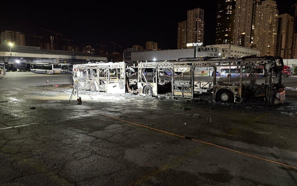 The shell of a bus after it was blown up by an explosive device in a Bat Yam bus parking lot, February 20, 2025. (Israel Fire and Rescue Authority)