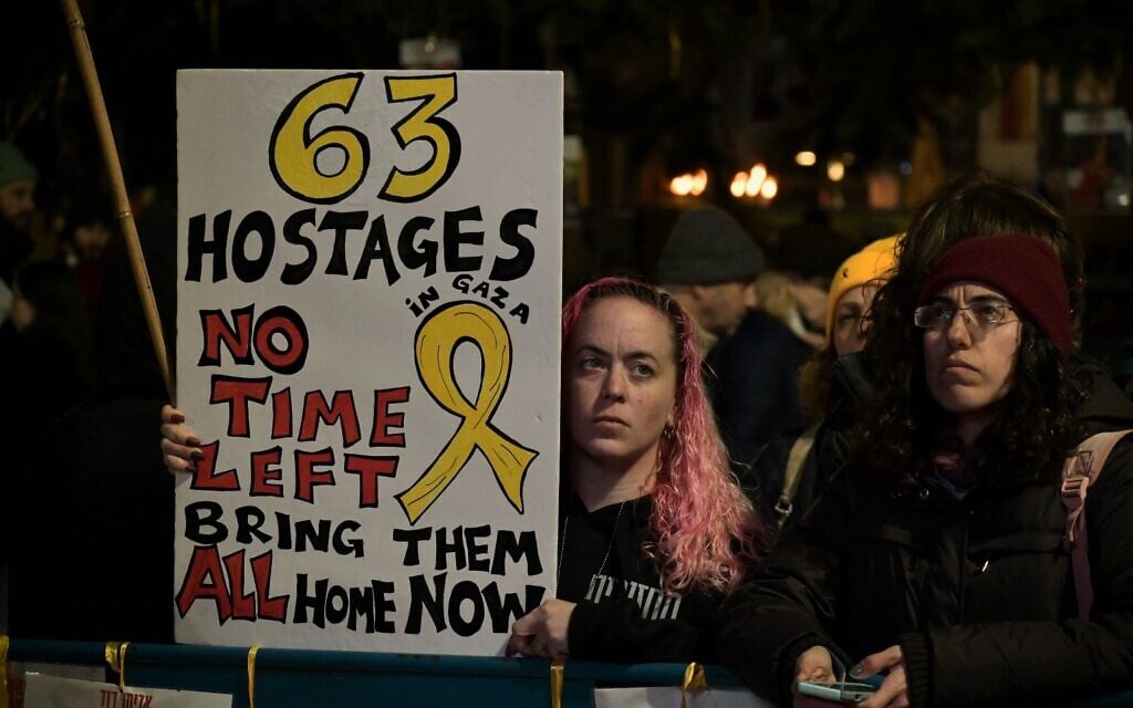 Protesters at Hostages Square in Tel Aviv call for the release of all 63 hostages still held in Hamas captivity, February 22, 2025. (Omer Yelin/Pro-Democracy Protest Movement)