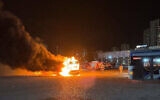 A bus goes up in flames after an explosion at a parking lot in Bat Yam, February 20, 2025. (Screenshot)
