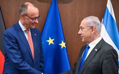 Prime Minister Benjamin Netanyahu, right, meets Germany's then-opposition leader, now Chancellor Friedrich Merz at the Prime Minister's Office in Jerusalem, February 12, 2024. (Kobi Gideon / GPO)