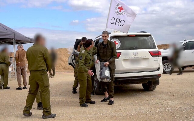 Released hostage Or Levy is handed over to IDF forces in the Gaza Strip on February 8, 2025 (Screencapture/IDF)