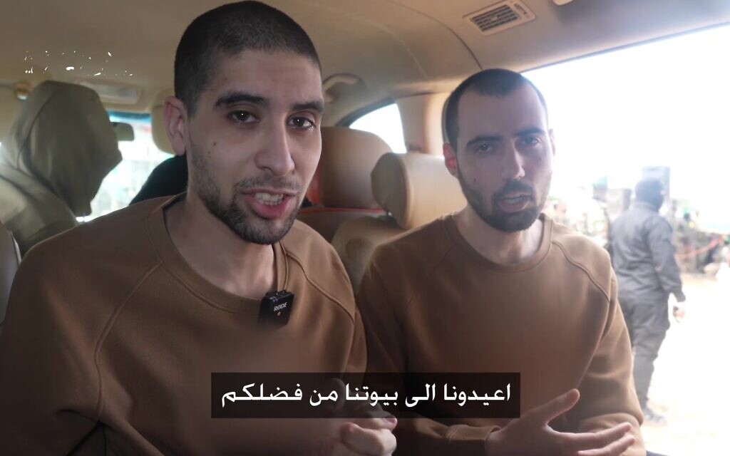 Hostages Evyatar David (left) and Guy Gilboa-Dalal speak in a Hamas propaganda video filmed at the site and time of the release ceremony in Gaza for three other captives, February 22, 2025. (Screenshot: Telegram)