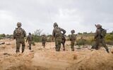 IDF troops of the 252nd Division operate in northern Gaza, in a handout photo issued by the military on March 20, 2025. (Israel Defense Forces)