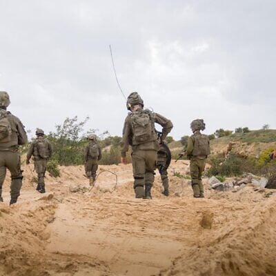 Illustrative: IDF troops of the 252nd Division operate in northern Gaza, in a handout photo issued by the military on March 20, 2025. (Israel Defense Forces)