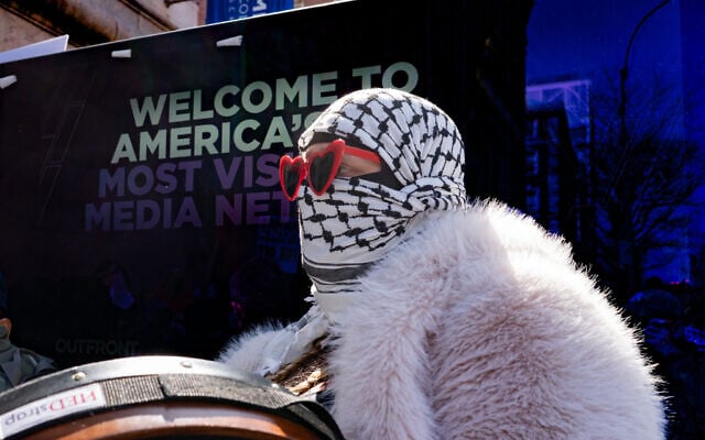An anti-Israel protester outside Columbia University in New York City, March 14, 2025. (Luke Tress/Times of Israel) An anti-Israel protester outside Columbia University in New York City, March 14, 2025. (Luke Tress/Times of Israel)