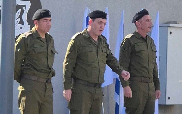 Incoming IDF Spokesman Brig. Gen. Effie Defrin (left) Operations Directorate chief Maj. Gen. Oded Basiuk (center) and outgoing spokesman Rear Adm. Daniel Hagari at a handover ceremony at an army base in Tel Aviv, March 27, 2025. (Emanuel Fabian/Times of Israel) Incoming IDF Spokesman Brig. Gen. Effie Defrin (left) Operations Directorate chief Maj. Gen. Oded Basiuk (center) and outgoing spokesman Rear Adm. Daniel Hagari at a handover ceremony at an army base in Tel Aviv, March 27, 2025. (Emanuel Fabian/Times of Israel)