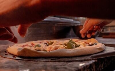 A Margherita pizza at Haifa's NeoPolitan, which ranked 25th in 50 Top Pizza on March 10, 2025. (Courtesy)