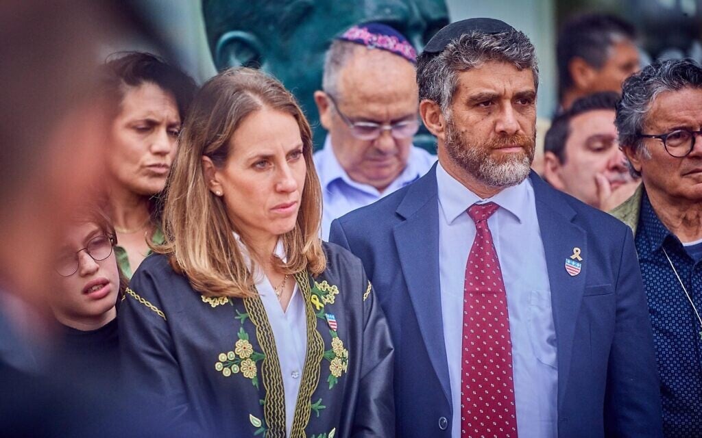 Shira and Moshe Shapiro, whose sone Aner Shapiro was killed batting away grenades launched by terrorists in the Hamas-led onslaught of October 7, 2023, attend the dedication of a bust in his image in Beziers, France, in May 2024. (Courtesy)