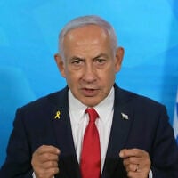 In this image made from a video released by the Israeli Government Press Office, Prime Minister Benjamin Netanyahu gives a statement Tuesday, March 18, 2025, in Tel Aviv, Israel. (Government Press Office via AP)