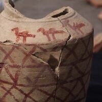 Archaeologists discovered a 1200-year-old clay jug depicting camels at Yatir Forest in the Negev. (Emil Aladejm, Israel Antiquities Authority)