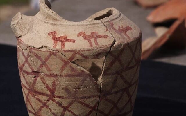 Archaeologists discovered a 1200-year-old clay jug depicting camels at Yatir Forest in the Negev. (Emil Aladejm, Israel Antiquities Authority)