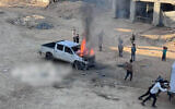 A Toyota pickup truck ablaze in Gaza after an IDF raid, March 24, 2025. (X, used in accordance with clause 27a of the copyright law)