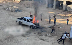 A Toyota pickup truck ablaze in Gaza after an IDF raid, March 24, 2025. (X, used in accordance with clause 27a of the copyright law)