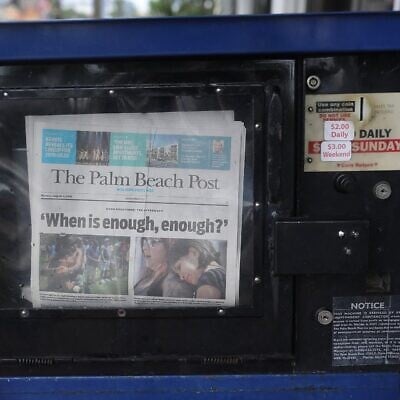 Illustrative: The Palm Beach Post is seen for sale on August 5, 2019 in Palm Beach, Florida. (Joe Raedle/Getty Images/AFP) Illustrative: The Palm Beach Post is seen for sale on August 5, 2019 in Palm Beach, Florida. (Joe Raedle/Getty Images/AFP)