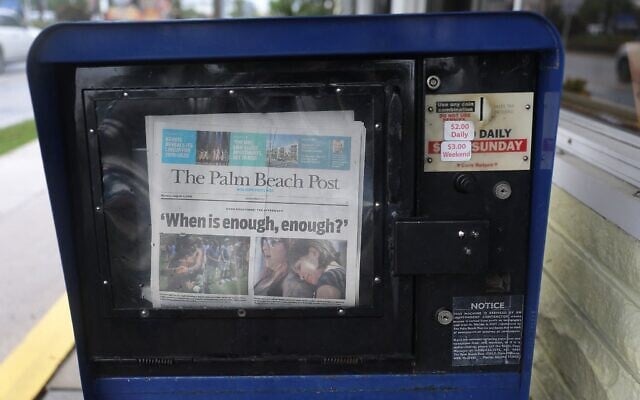 Illustrative: The Palm Beach Post is seen for sale on August 5, 2019 in Palm Beach, Florida. (Joe Raedle/Getty Images/AFP) Illustrative: The Palm Beach Post is seen for sale on August 5, 2019 in Palm Beach, Florida. (Joe Raedle/Getty Images/AFP)