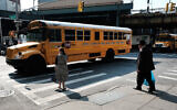 A yeshiva school bus drives through Borough Park on September 12, 2022 in the Brooklyn borough of New York City (Spencer Platt / Getty Images North America / Getty Images via AFP)
