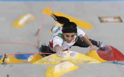 Iranian climber Elnaz Rekabi competing during the women boulder finals of the Asian Championships of the IFSC in Seoul, South Korea. (Photo by Rhea KANG / INTERNATIONAL FEDERATION OF SPORT CLIMBING / AFP)