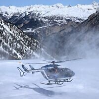 Illustrative: An helicopter of the French 'Peloton de Gendarmerie de Haute Montagne' (High Mountain Police Squad, PGHM) lands during an avalanche search and rescue training, near Briancon in the French Alps on March 16, 2023. (Nicolas TUCAT / AFP)