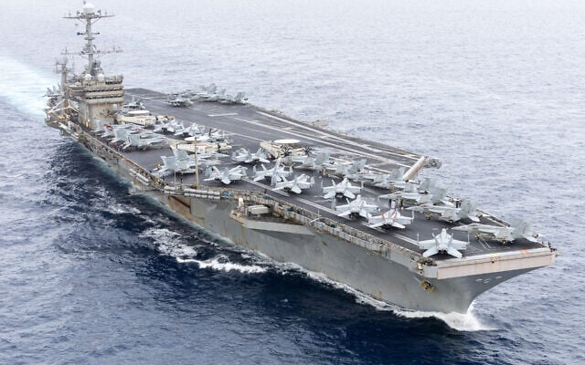 In this handout image provided by the US NAVY the Nimitz-class aircraft carrier USS Harry S. Truman (CVN 75) transits the Strait of Gibraltar, November 25, 2024. (Michael Gomez / US NAVY / AFP) In this handout image provided by the US NAVY the Nimitz-class aircraft carrier USS Harry S. Truman (CVN 75) transits the Strait of Gibraltar, November 25, 2024. (Michael Gomez / US NAVY / AFP)