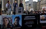 Relatives rally in Paris in support of French nationals being held by Iran Cecile Kohler, Jacques Paris and Olivier Grondeau on February 1, 2025. (Sébastien Dupuy/AFP)
