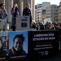 Relatives rally in Paris in support of French nationals being held by Iran Cecile Kohler, Jacques Paris and Olivier Grondeau on February 1, 2025. (Sébastien Dupuy/AFP)