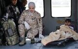 This handout picture released on March 4, 2025, by the Jordanian army shows a child who has been evacuated from the Gaza Strip arriving in a Jordanian army helicopter at a hospital compound in Amman. (Jordanian Royal Palace/AFP)