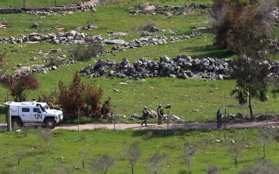 UNIFIL peacekeeping troops patrol the southern Lebanese village of Ramia near the southern border on March 5, 2025. (Mahmoud ZAYYAT / AFP)